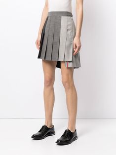 Shop Thom Browne dropped back pleated mini skirt with Express Delivery - FARFETCH Formal Mini Pleated Skort, Formal Mini Length Pleated Skort, Formal Mini Pleated Skirt, Elegant Mini Skirt With Accordion Pleats, Mini Skirt With Pleated Hem, Relaxed Fit Mini Skirt With Accordion Pleats, Relaxed Mini Skirt With Accordion Pleats, Accordion Pleated Mini Skirt, Thom Browne Women