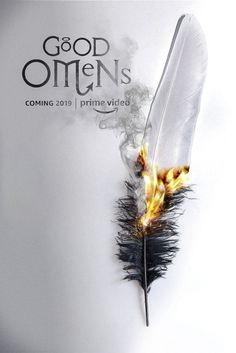 a feather with flames coming out of it and the words good omens coming 2013