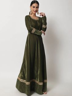 This is a beautiful 2-piece suit set. It comes with solid anarkali style kurta comes with gota, sequin & zari detailing has round neck, full sleeves & floor length teamed with net sequin detailing dupatta. 2-piece set Color- Green Work- Gota, sequin & zari detailing Kurti Length - 54 inch Kurta Fabric-Velvet Dupatta Fabric - Net dupatta with sequin detailing Sleeves-Full Sleeves Neck-Round Neck Care - Dry Clean Velvet Anarkali, Velvet Kurti, Velvet Kurta, Green Anarkali, Velvet Dupatta, Floor Length Anarkali, Dupatta Style, Embroidered Kurti, Kurta Designs Women