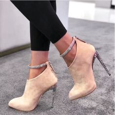 Giuseppe Zanotti For Jennifer Lopez. Suede Bootie Featuring Faceted Crystal Trim, 120-Mm Crystal And Mirrored Stiletto Heel, Pointed Toe, An Ankle Strap, Back Zip, Padded Leather Insole And A V-Shaped Vamp. Color: Nude Material: Sude Size: 38eu Heel Height: 120 Mm / 4.7" Condition: New No Box Eu38 Elegant Beige Boots With 4-inch Heel, Glamorous Ankle Boot Heels For Formal Occasions, Glamorous Formal Ankle Boot Heels, Beige Pointed Toe Party Boots, Chic Beige Boots For Party, Chic Beige Party Boots, Beige High Heel Evening Boots, Beige High Heel Boots For Evening, Designer Ankle Strap Boots For Party