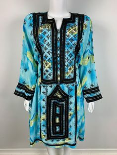 Afghan Vintage Balochi Embroidered Dress please contact for measurements. Fitted Silk Kaftan For Spring, Embroidered Silk Tunic With Long Sleeves, Embroidered Silk Long Sleeve Tunic, Silk Embroidered Long Sleeve Tunic, Long Sleeve Silk Embroidered Tunic, Fitted Long Sleeve Spring Kaftan, Blue Fitted Long Sleeve Tunic, Multicolor Embroidered Long Sleeve Embellished Dress, Embellished Long Sleeve Dress With Multicolor Embroidery