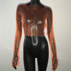 Rhinestone Fishnet Mesh Crop Top Elevate your style with our dazzling Rhinestone Fishnet Mesh Crop Top! This long-sleeve, see-through T-shirt is perfect for beach cover-ups, party nights, and clubbing. Its sexy and shiny design adds a touch of glamour to any outfit. Stand out in the crowd and make a bold fashion statement with this alluring tank top. SPECIFICATIONS Tops Type: Tees Style: Sexy & Club Sleeve Style: Regular Sleeve Length(cm): Full Season: All season Place Of Origin: China (Mainland Stretch Long Sleeve Sequin Mesh Top, Long Sleeve Stretch Mesh Top With Sequins, Stretch Long Sleeve Mesh Top With Sequins, Long Sleeve Fishnet Top For Party, Trendy Long Sleeve Fishnet Mesh Top, Fishnet Mesh Top For Summer Parties, Long Sleeve Fishnet Tops For Summer, Summer Party Mesh Top With Fishnet Details, Fishnet Party Tops For Spring