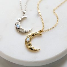 "Beautiful and lovely dainty moon necklace. Made of opal stone and CZ stone gold and silver color moon pendant with skinny gold plated and rhodium plated brass chain. Soft and simple. Great for gift, everyday or special occasion. Your item will ship in a gift box. Please feel free to contact me if you have any questions. ♥ Chain length 14\" - 20\" ♥ Moon pendant 5/8\" x 3/4\"  ♥ Gold plated over brass / Rhodium plated over brass /Opal stone  ♥ Creation Time: 1 - 3 days  ♥  See more Rudiana Accessories  Rudiana.etsy.com" Dainty Moon Necklace, Moon Necklace Gold, Silver Moon Necklace, Moon Necklace Silver, Gold Moon Necklace, Pendant Necklace Silver, Celestial Necklace, Gold Moon, Stone Pendant Necklace