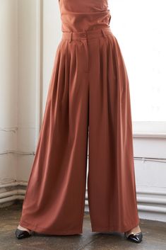 A solid woven wide leg pant with front closure, pleating details and pockets Details: Self : 100% Polyester Size & Fit - Model is 5`9" And Wearing Size Small- Measurements Taken From Size Small- Approx. Length: 44" Pleated Wide-leg Culottes For Work, Pleated Wide-leg Workwear Culottes, Solid Wide Leg Pants For Work, Spring Pleated Wide Leg Pants, Solid Pleated Wide Leg Ankle-length Pants, Chic Pleated Ankle-length Wide Leg Pants, Relaxed Fit Wide Leg Dress Pants For Fall, Pleated Wide-leg Pants, Fall Pleated Wide Leg Pants