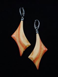 The earrings are one of a kind,  handmade from Flame Boxelder wood and have very smooth and brilliant surface.  It is very light earrings. Leverbacks are Rhodium plated. Care instructions: Avoid direct contact with perfumes, alcohol, water and other solvents that may damage wood finish. Wipe jewelry with soft dry cloth. Teardrop Wood Earrings For Gifts, Wooden Teardrop Earrings As Gift, Wooden Teardrop Earrings For Gift, Teardrop Wooden Earrings For Gifts, Modern Brown Earrings For Formal Occasions, Rectangular Polished Finish Earrings For Gift, Modern Brown Earrings For Gift, Rectangular Polished Earrings For Gift, Rectangular Polished Earrings For Gifts