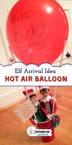 an air balloon with the words elf arrival idea and hot air balloons in front of it