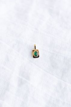 This tiny charm is great for adding a small pop of color - layer it with your initial charm or stack it on our Heart Locket! Chain not included - add it to your own or shop our collection of necklaces. Size: 16.1mm x 8mm x 3.2mm Smaller than a penny Material: 16K Gold Filled Core: Brass One Size Available Lead & Nickel Free Care: polish occasionally. avoid exfoliating scrubs and chlorine. We recommend taking jewelry off for showers, swimming, & sleeping - however! Lots of us do wear our jewelry Everyday 14k Gold Oval Pendant Charm Necklace, Everyday Oval Charms Jewelry, Dainty Oval Charm Necklace For Everyday, Gold Gemstone Charms For Everyday, Gold Gemstone Charms For Everyday Wear, Minimalist Oval Charms Jewelry, Locket Chain, Batik Pillow, Cake Stand Ceramic