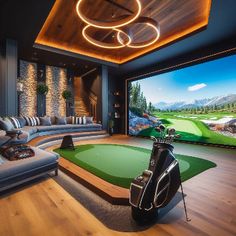 a living room filled with furniture and a golf simulator