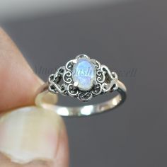 "Moonstone Boho Ring - Rainbow Moonstone Sterling Silver Ring - Oxidized Ring - Statement Ring - Moon Stone Ring - Rainbow Moonstone Ring SHOP LINK:- https://www.etsy.com/shop/MaaShabashibaJewell?ref=seller-platform-mcnav 》D E T A I L S《 Gemstone: Natural Rainbow Moonstone Gem Color: White Stone Shape: Oval Metal: 925 Sterling Silver Purity: 925 Parts Per 1000 Setting Type: Prong Set Silver Polish: High Ring Size: All Size Available Please note that there Can be slight variations in stone textur Silver Oval Moon Phase Ring, Silver Oval Ring With Moon Phase, Silver Oval Rings With Moon Phase, Handmade Moonstone Stackable Rings For Promise, Hand Forged Round Moonstone Ring, Stackable Moonstone Promise Ring Jewelry, Hand Forged Moonstone Jewelry For Promise Ring, Hand Forged Moonstone Jewelry For Anniversary, Hand Forged Oval Moonstone Ring