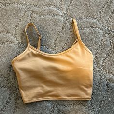 Never Worn Just Tried On But Took The Tags Off After Buying Nice Color Built In Bra! Summer Loungewear Sports Bra With Adjustable Straps, Summer Sports Bra With Adjustable Straps For Loungewear, Summer Cami Sports Bra For Loungewear, Fitted Tank Sports Bra For Loungewear, Fitted Sports Bra With Adjustable Straps For Loungewear, Summer Sports Bra For Loungewear, Fitted Beige Bra For Loungewear, Fitted Camisole Sports Bra For Loungewear, Fitted Camisole Bra For Loungewear