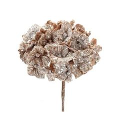 a close up of a flower on a stick with snow flakes around the petals