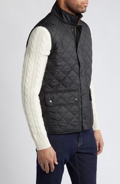 This sleek, diamond-quilted vest detailed with oversized flap pockets is a layering essential for the season and offers warmth, versatility and style. 27 1/2" length (size Medium) Front snap closure Stand collar Front snap-flap patch pockets Lined, with polyester fill 100% polyester Machine wash, line dry Imported Diamond Quilted Outerwear For Work In Fall, Classic Quilted Jacket With Padded Collar, Diamond-quilted Outerwear For Fall Workwear, Diamond Quilted Outerwear For Fall Workwear, Fall Workwear Outerwear With Diamond Quilting, Casual Quilted Jacket With Diamond Quilting For Fall, Casual Diamond Quilted Jacket For Fall, Classic Fitted Quilted Jacket For Winter, Winter Workwear Quilted Jacket With Diamond Quilting