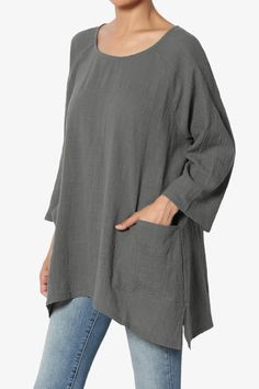 Loose fit tunic top is crinkled cotton-gauze to fall effortlessly over the body. Perfect for warm-weather days, it is subtly gathered for definition. Try it to the weekend with a short or long pants.Lightweight crinkled cotton gauze loose fit tunicRound neck, 3/4 wide raglan sleeevesGathered back yoke, dual patch pockets, high low slit hemFits true to US size, S=Size(4-6), M=Size(8-10), L=Size(12-14), XL=Size(16-18)Model size : 5'3" height, 33" bust, 24" waist, 34" hip, and is wearing a size S10 Fitted Tunic Tops, Kimono Blouse, Casual Kimono, Fitted Tunic, Wide Leg Crop Pants, Layered Shirts, Oversized Tunic, Loose Fitting Tops, Cotton Pullover