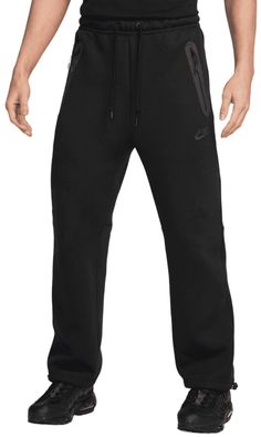 Fit & Design: Relaxed fit pants Premium lightweight fleece is smooth inside and out for added warmth without unnecessary bulk Designed to feel relaxed through the seat and thighs for a casual fit you can dress up or down Elastic waistband and internal drawcord deliver a comfortable, custom fit Zippered hand pockets let you securely stow your items Open hem lets pants rest comfortably over your shoes Black Fleece Gym Pants, Black Fleece Pants For Gym, Nike Winter Black Pants, Nike Black Winter Pants, Relaxed Fit Pants, How To Hem Pants, Tech Fleece, Athletic Apparel, Athletic Outfits