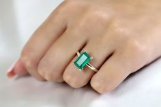 This Sterling Silver Green Onyx Ring features an emerald cut gemstone in a rectangle shape, creating a striking solitaire ring. The sterling silver setting complements the green onyx, making it a suitable choice for a cocktail ring, engagement, or promise ring. This piece combines traditional elements with a unique gemstone to create a distinctive piece of jewelry. ☛ 𝒜𝐵𝒞 - Add Engraving - https://etsy.me/3CLxYPZ ☛ Ring size - Select the size you would like from the drop down menu ♥ Gemstone T Rectangular Solitaire Emerald Jewelry, Rectangular Emerald Ring As A Gift, Anniversary Emerald Ring With Rectangular Stone, Rectangular Emerald Solitaire Ring, Rectangular Emerald Ring With Prong Setting For Promise, Fine Jewelry Solitaire Emerald Ring With Rectangular Stone, Emerald Rings With Prong Setting, Rectangular Shape, Emerald Solitaire Ring With Rectangular Stone, Emerald Rectangular Ring With Prong Setting