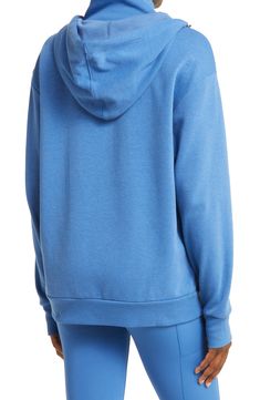 Take your workout look to the next level in a sporty hooded sweatshirt featuring thumbhole cuffs and a split kangaroo pocket for carrying your essentials. Drawcord-toggle hood   Long sleeves with thumbhole cuffs   Reflective details enhance visibility in low light or at night   OEKO-TEX®–certified materials free of harmful substances   61% organic cotton, 39% recycled polyester   Machine wash, line dry   Imported