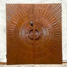 a wooden door with an intricate design on it