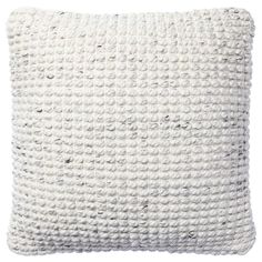 a white pillow on a white background