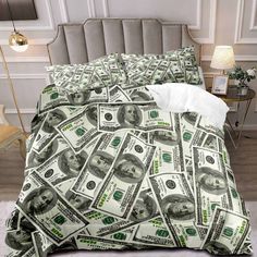 a bed covered in money on top of a wooden floor