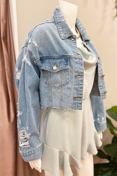 Cropped denim jacket with slight distressing and unfinished hem. Stocked at the Greenville Mall. Crop Denim Jacket Outfit Women, Denim Jacket For Women, Cropped Distressed Denim Jacket, Crop Denim Jacket Outfit, Demin Jacket Outfits, Crop Jackets For Women, Jeans Jackets For Women, Denim Jacket Outfit Women, Cropped Denim Jacket Outfit