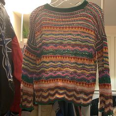 Colorful Patterned Loose Fitting See Through Knit Sweater Size Small Casual Patterned Knit Tops, Multicolor Knit Casual Sweater, Trendy Multicolor Knit Top For Fall, Trendy Multicolor Crew Neck Knit Top, Casual Multicolor Knit Sweater, Multicolor Pointelle Knit Sweater For Spring, Multicolor Crew Neck Sweater For Spring, Trendy Multicolor Knit Sweater, Casual Multicolor Crew Neck Knit Top