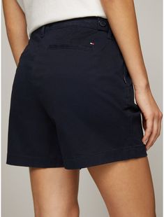 Tommy Hilfiger women's short. Made from soft, stretch fabric and cut in an easy fit, our go-to short is comfortable and flattering.  Material: 77% Cotton, 20% Reprocessed Cotton, 3% Elastane. Solid Color Relaxed Fit Bermuda Shorts, Relaxed Fit Solid Bermuda Shorts, Classic Mid-rise Shorts With Built-in Shorts, Solid Bermuda Shorts For Work, Tommy Hilfiger Casual Short Length Bottoms, Casual Tommy Hilfiger Short Bottoms, Cotton Mid-rise Shorts For Workwear, Casual Mid-rise Bottoms By Tommy Hilfiger, Casual Tommy Hilfiger Spring Shorts