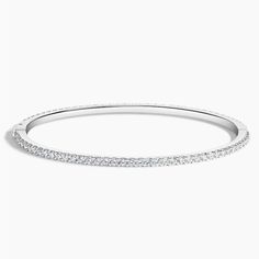 Luxe Whisper Lab Diamond Eternity Bangle Bracelet - 18K White Gold. This shimmering eternity bangle embellishes the wrist with glimmering lab grown diamonds for an elegant and stackable look (2 2/5 total carat weight). Diamond Bangle With Pave Setting, Timeless Jewelry Bangle With Pave Setting, Timeless Anniversary Bangle With Pave Setting, Elegant Bangle Bracelet With Pave Setting, Diamond White Bangle With Pave Setting, Diamond White Cubic Zirconia Bangle With Pave Setting, White Round Bangle With Pave Setting, Dazzling Bangle With Pave Setting, White Gold Bangle With Pave Setting