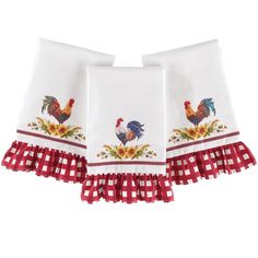 two white towels with roosters on them and red gingham checkered border