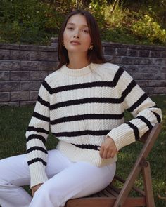 Product Details The Isadora Sweater is expertly crafted with a thick cable knit design and a soft cotton blend for a cozy and comfortable feel. The classic stripes add a touch of timeless style, while the elevated crewneck adds a touch of sophistication. Stay warm and stylish with this must-have sweater. - Crewneck- Content: 55% Acrylic, 45% Cotton Style# C24KSWJ54100 Fit Notes - Model wearing a size S - Model measurements: 5'10'' Height / 32'' Bust / 25'' Waist / 35'' Hips- Garment measurements Striped Long Sleeve Cable Knit Sweater, Striped Textured Knit Cotton Sweater, Black Cotton Cable Knit Sweater, Striped Chunky Knit Crew Neck Sweater, Fall Striped Cable Knit Sweater, Cotton Sweater, Knitting Designs, Cotton Style, S Models