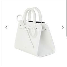 New In Pink Box And With Dust Bag Mansur Gavriel Mini Mini Sun Bag In White. Yes These Are Brand New So You Can Gift It To Your Friend, Wife, Gf, Sister, Mom, Etc. Please Message Me If You Have Any Questions. Also Selling A Pink One In Separate Listing. Both Colors Are Brand New. Sold Out, They Are Not Making The Sun Bag Line Anymore. Designer White Satchel As Gift, Luxury White Pouch Box Bag, Luxury White Tote Box Bag, White Luxury Tote Box Bag, Designer White Box Bag With Removable Pouch, Luxury White Rectangular Box Bag, White Shoulder Box Bag With Dust Bag, Modern Double Handle Box Bag For Gift, Modern Double Handle Box Bag As Gift