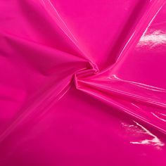 a pink plastic sheet is shown in close up