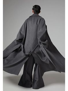 Redefine sophistication with this oversized, extra-long trench coat. Crafted from a premium wool-blend, it merges timeless style with a modern, commanding presence. The perfect piece for the man who values bold luxury and versatile elegance. Essential Features: Premium Wool-Blend: Offers warmth and durability. Extra Long Design: Creates a dramatic, statement-making look. Oversized Fit: Bold, relaxed silhouette for maximum style. Timeless Elegance: Classic trench coat details for versatility. Limited Edition: Exclusively for those who seek luxury in every detail. Size Chart Measurements are in inches. Size Bust Sleeve Length S 52.76 31.89 49.21 M 56.69 33.07 50.39 L 60.63 34.25 51.57 Coat Details, Classic Trench Coat, Long Trench, Long Trench Coat, Timeless Style, Extra Long, Oversized Fits, The Man, Timeless Elegance