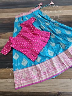 This Lehenga suits 9 yr - 10 yr. Kindly please contact us if needed measurements before purchase. Fitted Silk Sets With Traditional Patterns, Fitted Bollywood Sharara With Traditional Patterns, Fitted Banarasi Silk Sets For Traditional Ceremonies, Fitted Art Silk Sets With Traditional Patterns, Traditional Brocade Dresses With Unstitched Blouse, Fitted Sets With Zari Weaving For Festivals, Festive Fitted Sets With Zari Weaving, Fitted Sets With Zari Weaving For Navratri, Fitted Designer Sets With Zari Weaving