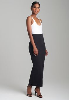 Classic, flirtatious, and sexy. This black midi length pencil skirt is a must in every wardrobe. Its built up waistline offers a smooth and seamless look. Pairs perfectly with our Colette Wrap Top or keep it sleek with a black top, either way this basic is a wardrobe addition that offers endless styling options. Wear it for a night of dancing in Spain, an evening of drinks at the Ritz, or to dinner with your love. Italian Stretch Cotton Fabric Midi Length Pencil Skirt Built Up Waistline Zipper C Silk Wrap Top, Basic Black Dress, All Black Dresses, Bias Cut Dress, Stretch Pencil Skirt, Stretch Cotton Fabric, Black Short Dress, Stretch Skirt, Silk Slip Dress