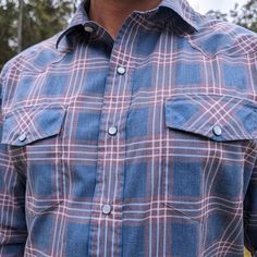 Timeless style meets comfortable fabrics in the Western Aloha Palaka Nui Long-Sleeve Snap Shirt. This western-inspired button-up relies on a polyester and cotton blend to keep us covered and comfortable from trailheads to beer halls. Outdoor Relaxed Fit Shirt With Buttons, Outdoor Long Sleeve Shirt With Button Closure, Long Sleeve Shirt With Button Closure For Outdoor, Casual Outdoor Shirt With Buttons, Relaxed Fit Outdoor Tops With Button Closure, Outdoor Relaxed Fit Tops With Button Closure, Fitted Shirt With Pockets And Casual Collar, Relaxed Fit Tops With Button Closure For Outdoor, Outdoor Long Sleeve Shirt With Snap Buttons