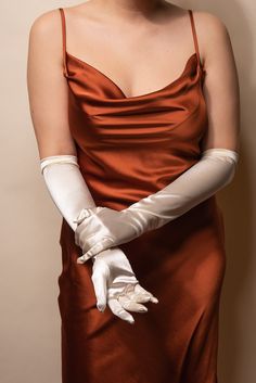 Looking for a glamorous addition to your outfit? These women's elbow-length satin gloves are the perfect choice. Made from soft and comfortable satin, they will fit snugly and feel great against your skin. These gloves come in a range of colors to suit any outfit, and the extra-long length will add elegance to any look. Perfect for weddings, formal events, or just adding a touch of sophistication to your everyday outfits. Order your pair today and take your style to the next level! SizeLength: 1 Affordable Elegant Formal Neckwear, Luxury Classic Neckwear For Formal Events, Luxury Elegant Semi-formal Neckwear, Cheap Elegant Formal Neckwear, Satin Gloves Outfit, Long Gloves Aesthetic, Long Gloves Outfit, Prom Suits For Women, Women Prom Suit