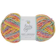 the yarn ball is multicolored and has a white tag on it that says baby gee