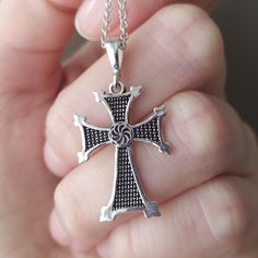 Christian cross made of sterling silver 925 with Armenian symbols of arevakhach or kerkhach which looks like a sun. The cross has a deep meaning for Armenians. Armenians were the first in the world to recognize Christianity as a state religion. Despite the fact that the cross carries Armenian symbols and meanings, it will suit all men and women who are interested in ancient symbols. The pendant cross really looks very stylish. The fact that it is made of precious metal gives it a special value a Silver Symbolic Cross Necklace, Symbolic Cross Necklace As Gift, Symbolic Cross Necklace Gift, Traditional Silver Cross Necklace, Traditional Silver Cross Necklace As Gift, Traditional Silver Cross Necklace Gift, Silver Hallmarked Cross Necklace, Hallmarked Silver Cross Necklace, Silver Symbolic Cross Necklace As Gift