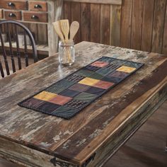 a wooden table with some utensils on it