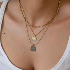 A unique necklace with an amazing square pendant with a semi-precious gemstone on a cobra stainless steel chain. It's special and perfect for a feminine look. You can choose between Labradorite, Moonstone and Turquoise.  These materials remain beautiful and do not wear off. MEASUREMENTS AND SIZE The necklace is about 17.3 inches long (44 cm) with a 1.9in./5cm chain extender The gold semi precious stainless steel pendant has approximately is 0,59x0,59in (15x15mm) MADE FROM This necklace is made from gold stainless steel gemstone. These materials are thick, sturdy, and they don't bend. Nickel free and lead free. GIFTS OF LOVE All of our jewelry come gift wrapped with love, even if you purchase it for yourself. If this is a gift we can make it even more special. Just let us know with a commen Handmade Square Pendant Jewelry For Everyday, Tarnish Resistant Square Pendant Jewelry For Everyday, Modern Square Jewelry With Adjustable Chain, Silver Charm Necklaces With Clavicle Chain, Tarnish Resistant Metal Necklace With Rectangular Pendant, Minimalist Square Jewelry With Adjustable Chain, Stainless Steel Jewelry With Adjustable Chain And Rectangular Pendant, Stainless Steel Jewelry With Rectangular Pendant And Adjustable Chain, Minimalist Handmade Jewelry With Square Pendant