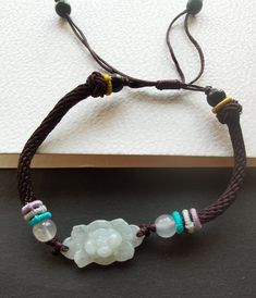 "Weave Rope lotus flower Natural Burmese jadeite jade,stone bead bracelet,Grade A,amulet,protector,mood,good lucky gift,gemstone,Yoga Jewelry material: natural jadeite jade stone,rope  Size:  flower : approx. 12mmx24mmx5mm Rope Color: brown color length:6\"-9\" style: weave rope,adjustable bracelet Price: one bracelet ❤ If you want other length Bracelet, Please connect me free. ❤Please read the store policy before purchase. ❤ Thank you for visiting my shop!" Traditional Adjustable Jade Bracelets, Traditional Adjustable Jade Bracelet, Handmade Jade Bracelets For Meditation, Good Luck Jade Bracelets Spiritual Style, Spiritual Jade Bracelets For Good Luck, Traditional Jade Jewelry For Meditation, Bronze Chain Necklace, Lucky Gifts, Stone Beaded Necklace