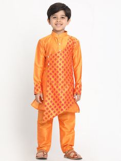 Vastramay Boys Orange Ethnic Motifs Angrakha Kurta with Pyjamas Bollywood Style Sets With Motifs For Eid, Traditional Drape Bandhani Sets For Eid, Traditional Diwali Sets With Traditional Drape, Festive Eid Sets With Motifs, Festive Orange Art Silk Sets, Traditional Kurta For Puja In Transitional Season, Art Silk Sets For Traditional Ceremonies And Eid, Art Silk Sets For Puja And Festive Season, Art Silk Sets For Puja And Festive Occasions