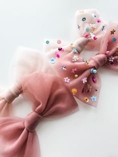 SPARKLE + TULLE and TULLE [plain] is here! Each embellishment is hand sewn & stunning! Available in 4 size options, on bow on nylons or clips! Tulle Crafts, Tulle Bow, Diy Bows, Mini Bow, Tulle Bows, Space Party, Sequin Bow, Mini Bows, Small Bows