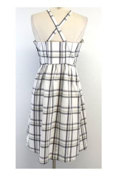 Size 8 White, Grey & Yellow Plaid Dress Shell 65% cotton 35% linen Lining 100% acetate Criss-cross straps Empire waistline Concealed side zip & hook 2 open hip pockets Belt loops Very tiny front discoloration spots Shoulder to hem 39" Yellow Plaid Dress, Empire Waistline, Yellow Plaid, Pocket Belt, Casual Work, Plaid Dress, Cross Straps, Work Casual, Cotton Dress