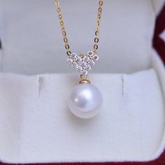 Elevate your style with this 10-11mm freshwater pearl necklace, showcasing a striking white and purple dual-tone pearl. Set within a cubic zirconia-adorned heart pendant, the lustrous pearl offers an enchanting blend of colors. Perfect for adding a touch of elegance to any ensemble, this necklace is a blend of classic allure and modern romance. Ideal as a standout gift or a personal treat. Necklace Chain, material 925 sterling silver, color in gold or white. it is matching with the color of the White Cubic Zirconia Heart Cut Necklaces, Valentine's Day Pearl White Pearl Jewelry, Elegant Silver Heart-shaped Pearl Necklace, Pearl Drop Heart Pendant Jewelry, Heart-shaped Pearl Pendant Jewelry, Pearl Pendant Necklace With Diamond Accents For Gift, Pearl Necklace With Diamond Accents As A Gift, White Pearl Chain Jewelry With Cubic Zirconia, Elegant Pearl White Jewelry With Heart Charm