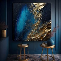 a blue and gold abstract painting on a wall in a living room with two stools