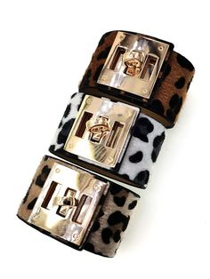 Leopard Wrap Leather Bracelet. Crafted from high-quality leather, this bracelet features a leopard print pattern that adds a fierce and trendy vibe to your wristwear. The wrap design allows for versatile styling - wear it snug for a bold cuff effect or slightly loose for a laid-back, bohemian look. The magnetic clasp ensures a secure fit while adding a touch of modern sophistication. The leopard print, synonymous with strength and confidence, makes this bracelet a symbol of empowerment and bold Leopard Print Pattern, Bohemian Look, Bracelet Clasps, Magnetic Clasp, Bold Fashion, Box Chain, Print Pattern, High Quality Leather, Types Of Metal