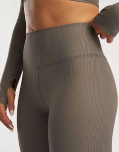 The Rise Capsule awakes - taking ECHT's seamless fabric into a reinforced cut and sew design. These high-waisted tights are made of a soft and flexible ribbed fabric that follows the body's movements in a natural way and creates a beautiful shaping effect. Featuring an advanced heat pressed silicone logo, hidden waist pocket - the Rise leggings are suitable for all day wear and high intensity workouts. Pair it with your favourite coloured Rise Zip Up for ultimate style - High Waisted: To keep yo Ribbed Stretch Leggings For Sports, High Stretch Ribbed Full-length Activewear, Ribbed High Stretch Full Length Activewear, Full-length High Stretch Ribbed Activewear, Full Length Ribbed High Stretch Activewear, Fitted Full Length Ribbed Activewear, High Stretch Ribbed Elastane Leggings, Stretch Ribbed Yoga Pants For Workout, Fitted Ribbed Leggings For Athleisure