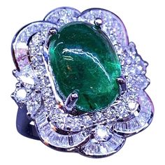 An exquisite ring in Art Deco style , so chic and refined, a classic design perfect for all events. Ring come in 18k gold with a fabulous Zambia emerald, cabochon cut of 8,78 carats, fine quality, and round and baguettes cut diamonds of 2,15 carats,F/VS, top Emerald Cabochon, Zambian Emerald, 18k Gold Ring, Baguette Cut Diamond, Gem Stone, Zambia, Art Deco Style, Deco Style, Art Deco Fashion