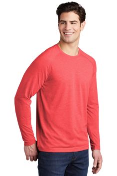 This ultracomfortable tee combines moisture-wicking performance, unbeatable tri-blend softness and PosiCharge technology to lock in color.; 4.4-ounce, 75/13/12 poly/cotton/rayon jersey with PosiCharge technology; 4.6-ounce, 75/13/12 poly/cotton/rayon jersey with PosiCharge technology (Black Triad Solid); 4.7-ounce, 75/13/12 poly/cotton/rayon jersey with PosiCharge technology (White Triad Solid); Removable tag for comfort and relabeling; Dyed-to-match neck taping; Raglan sleeves Red Long Sleeve Sports T-shirt, University Red Long Sleeve Top, Casual University Red Moisture-wicking Tops, Red Long Sleeve Sports Top, University Red Moisture-wicking Crew Neck Top, Red Moisture-wicking Crew Neck Top, Neck Taping, Color Locks, Raglan Tee